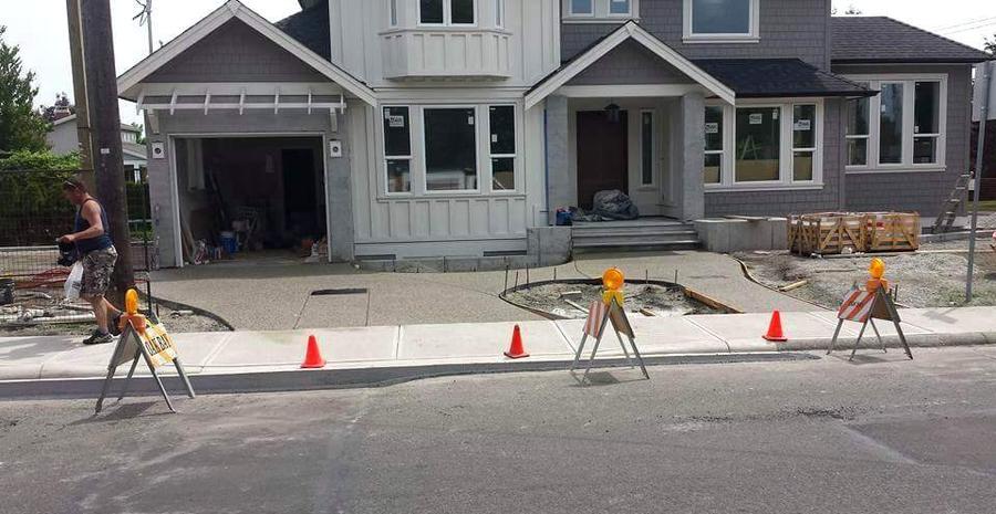 Finished exposed-aggregate concrete driveway at a home in Oak Bay, BC